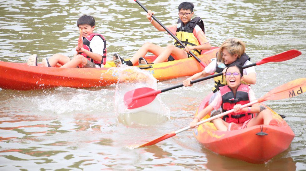 youths kayaking